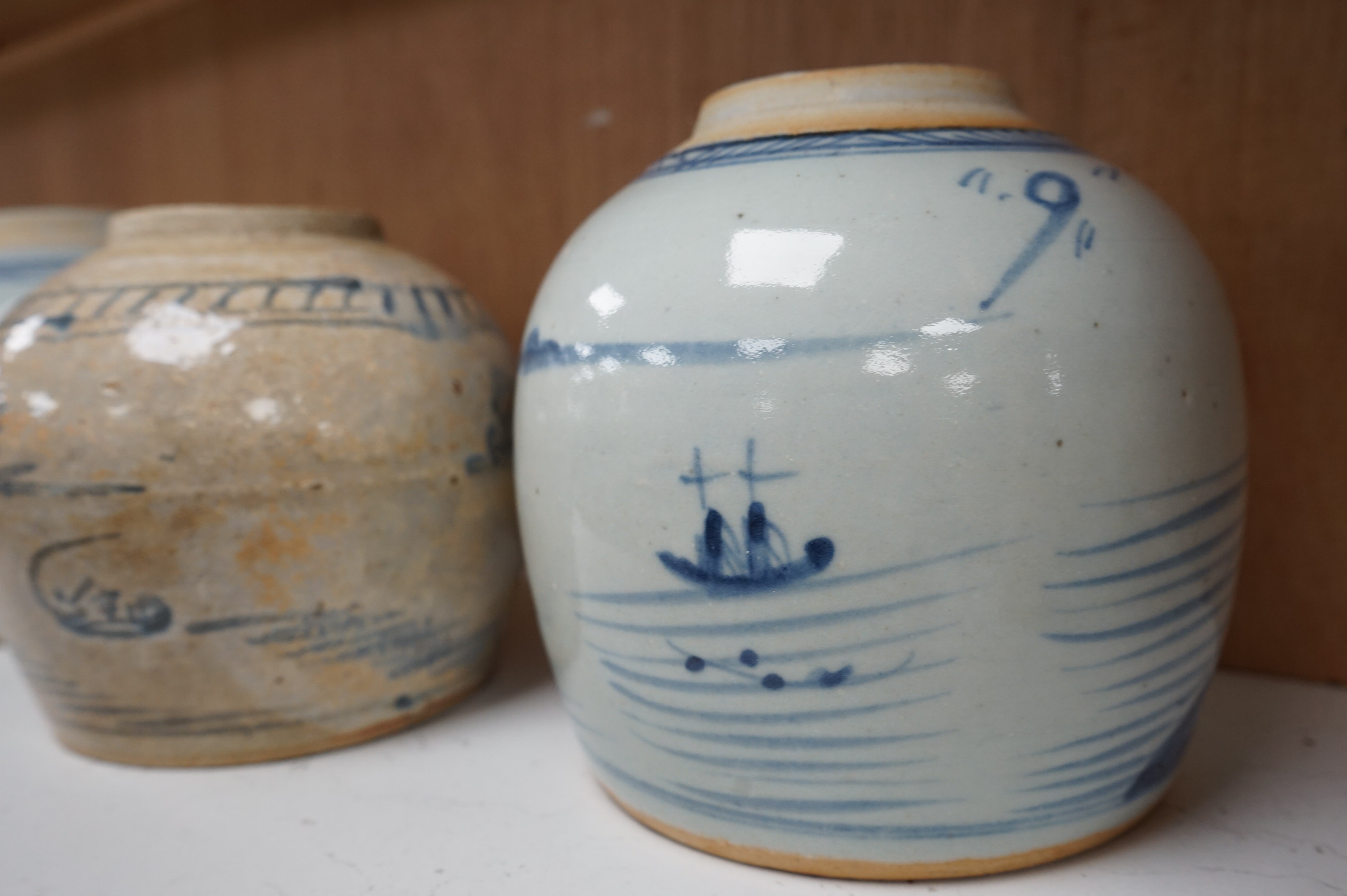 Three 18th/19th century Chinese blue and white jars, tallest 16.5cm high. Condition - fair